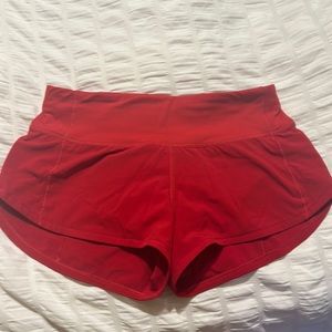 Like new-worn once- low rise-size 4 -2.5 red speed ups